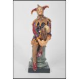 A Royal Doulton figurine entitled ' The Jester ' HN 2016 , 1949 - 1996 early printed green mark,