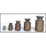 A group of five 19th century Victorian bronze graduating bell weights, Stamped Avery. Highest