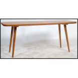 A 1960's retro teak wood coffee / occasional table having never been used coming only out of its