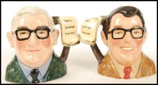 A Royal Doulton pair of Small Character Jugs: The Two Ronnies comprising Ronnie Barker D7114 and