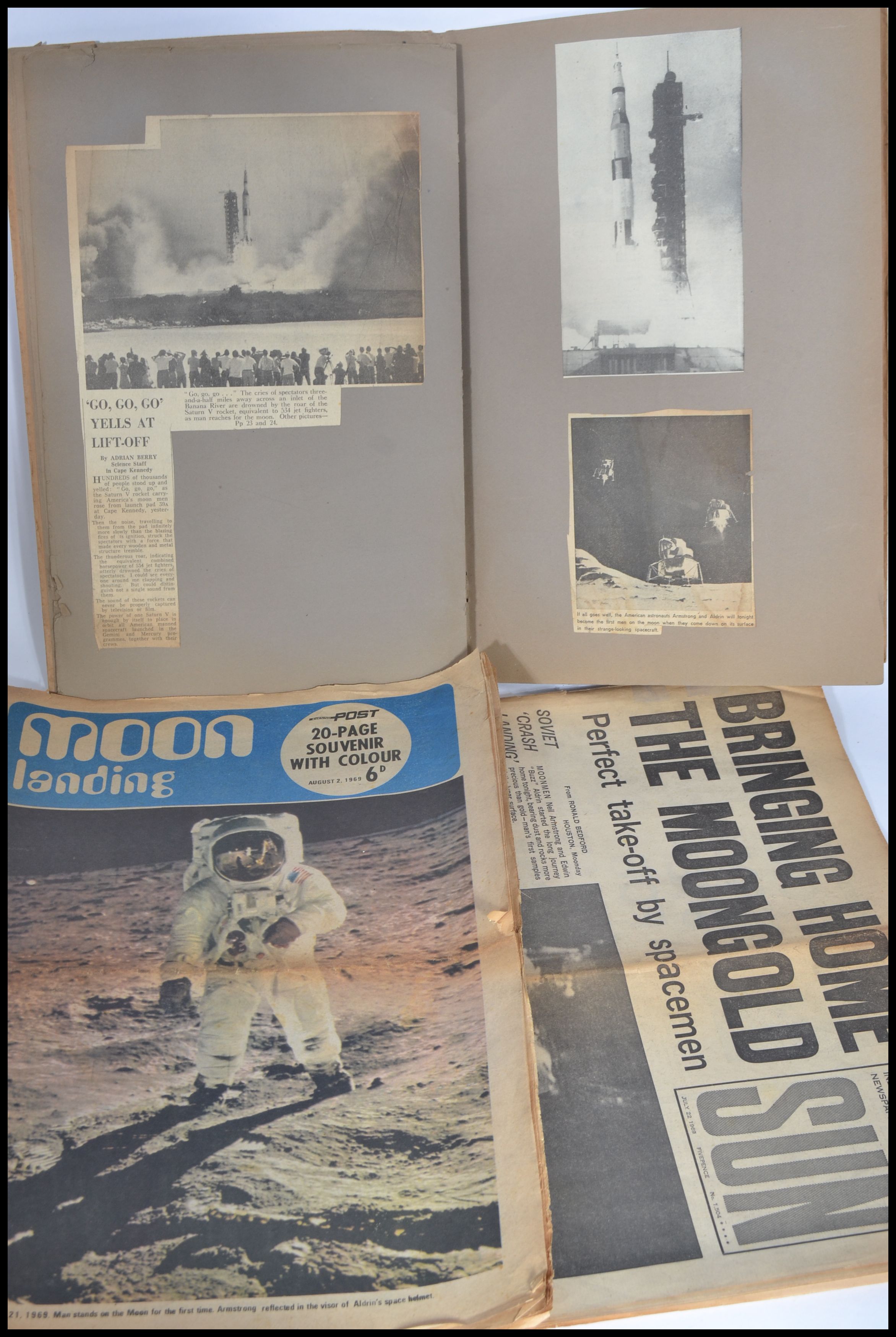 A collection of ephemera pertaining to The Moon Landing to include newspaper , scrapbook etc. Please