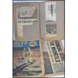 A collection of ephemera pertaining to The Moon Landing to include newspaper , scrapbook etc. Please