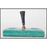 A Royal Doulton shagreen desk pen stand made for Parker Pens printed Doulton mark. Measures 15cms