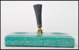 A Royal Doulton shagreen desk pen stand made for Parker Pens printed Doulton mark. Measures 15cms