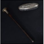 A silver hallmarked Edwardian parasol handle together with a silver hallmarked lidded dressing table