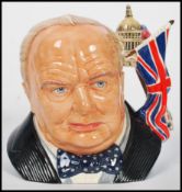 A Royal Doulton character jug depicting Prime Minister Winston Churchill D7298 , handle modelled