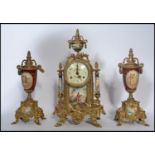 A 19th century German Continental clock and garniture set. The garnature's being of urn form with