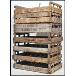 A collection of mid century large apple crates of slatted wood construction having various