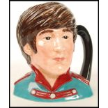 A Royal Doulton character jug, The Beatles John Lennon D6725 1991 Final year of issue. Note; from an