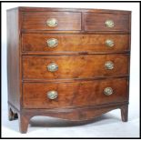 A 19th century Georgian mahogany bow fronted chest of three long and two short drawers, the brass