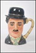 A Royal Doulton Character Jug : Charlie Chaplin D6949 limited edition of 5000 numbered 517. Measures