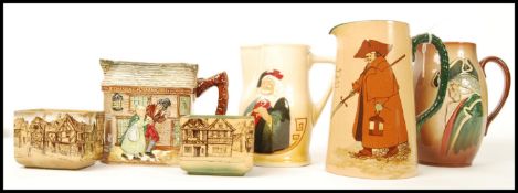 A group of 6x Royal Doulton Series Ware items to include; Old Curiosity Shop water jug, 2x Kings