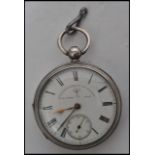 An Edwardian open face key-wound pocket watch named John Forrest London, Chronometer Maker to the