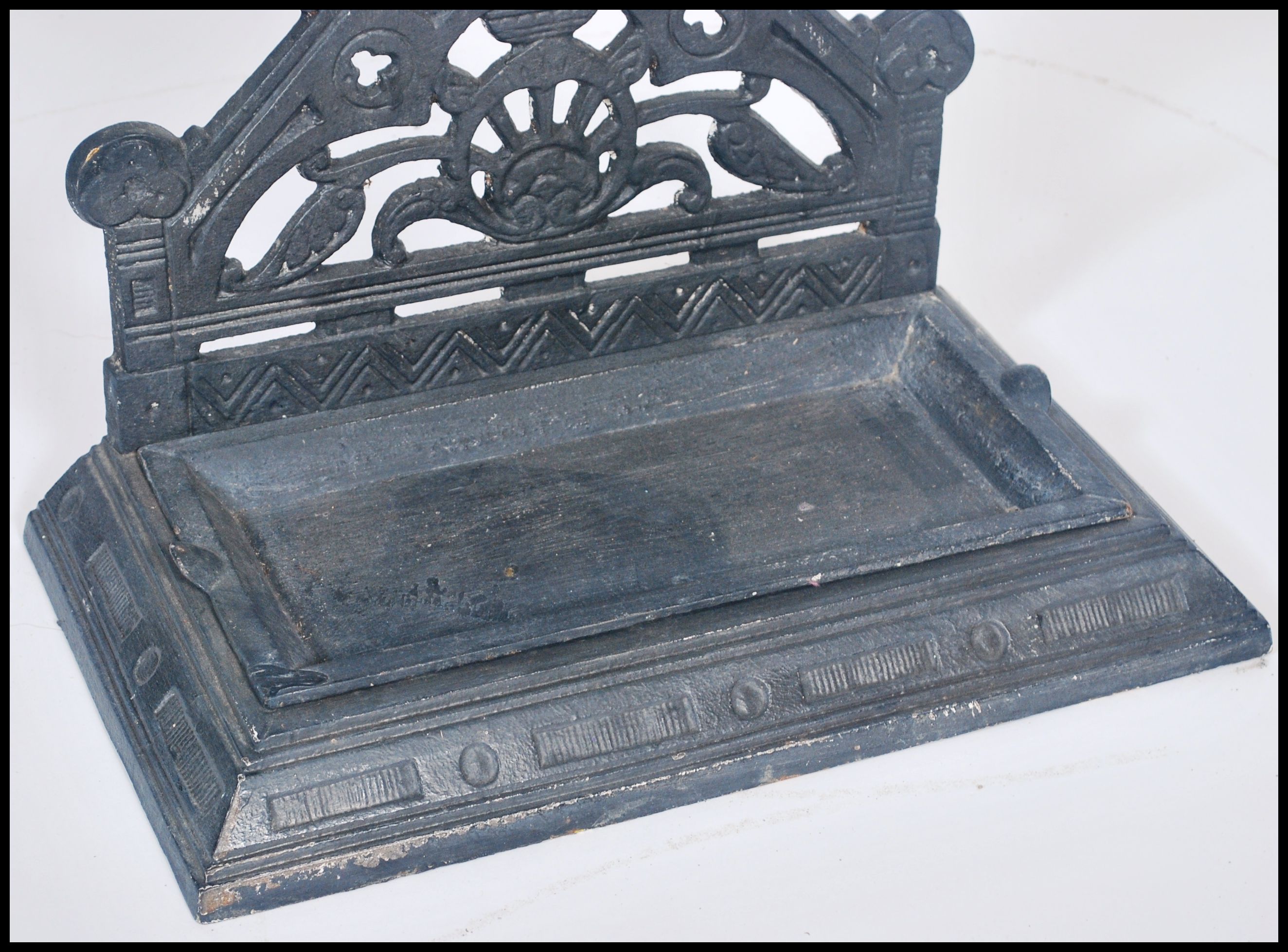 A Victorian cast iron aesthetic movement stick stand. Tray base with upright column back having - Image 2 of 5