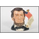 A Royal Doulton character jug depicting President Abraham Lincoln D6936 , handle modelled after
