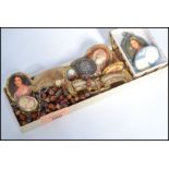 A collection of vintage cameo brooches dating from the 19th century along with a small group of