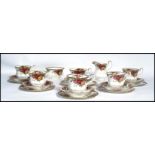 A Royal Albert Old Country Roses tea service consisting of cups , saucers , side plates etc.