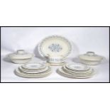 An extensive Royal Doulton Galaxy pattern dinner service consisting of various plates, lidded