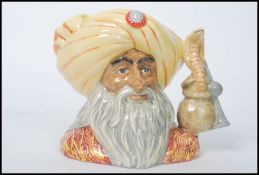 A Royal Doulton Character Jug : The snake charmer D6912 limited edition of 2500 numbered 2108. Note;