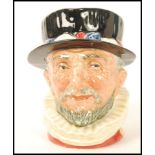 A Royal Doulton rare character colourway jug of the Beefeater having yellow highlights D6206. In