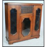 A 1930's large French oak library bookcase cabinet having end glass sentry box bookcase cabinets