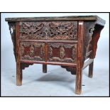 A believed late Qing dynasty / early Republic of China antique Chinese elm wood altar table chest