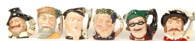 A collection of Royal Doulton character jugs entitled ' Dick Turpin ' D6528 , ' Cyrano De Bergerac '