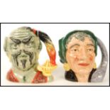 Two Royal Doulton large character jugs The Genie D6892 and The Fortune Teller D6497. Note; from an