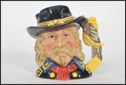 A Royal Doulton character jug depicting General Custer D7079 , handle modelled after sword and
