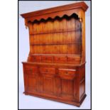 An excellent large hardwood / oak country dresser of impressive size having a wonderul overhanging