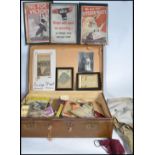 A large collection of ephemera held within a vintage suitcase to include licenses , photographs ,