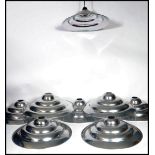 A set of eight vintage 20th century retro ' Space Age ' chrome ceiling pendant UFO type light shades