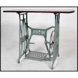 A good 19th century up cycled sewing machine table. Cast iron base with makers name Haid & Neu.