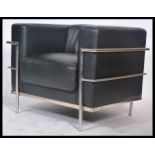 After Le Corbusier - An 'LC2 ' type black vinyl leather and chrome club chair. The armchair having a