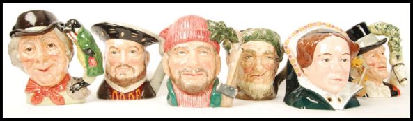 A group of six Royal Doulton Character jugs to include Queen Mary I D7188 , Owd Mac , The Lumberjack