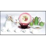 A collection of vintage ceramics to include 19th century ceramic ladles, cranberry glass dish and