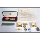 A collection of items to include a Women's Royal Voluntary Service Long Service medal together