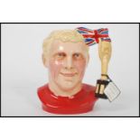 A Royal Doulton Character jug The Captain depicting football hero Bobby Moore D7261 0211/1500