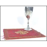 A vintage 20th century Mappin and Webb ecclesiastical wine communion goblet along with an