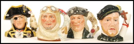 A group of four Royal Doulton character jugs to include Captain Scott D7116 , Vice-Admiral Lord