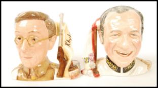Two Royal Doulton small character jugs of Sid James from Carry On Up The Khyber as Sir Sidney Ruff-