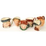 A group of Royal Doulton character jugs to include Tomy Weller , Simple Simon D6374 , Jarge , Old