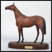 A Royal Doulton figure of Red Rum, DA 226 on stepped plinth, height 9.25" overall. In good order