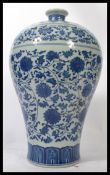 A 19th century Chinese blue and white Meiping plum shaped vase decorated with traditional scenes and