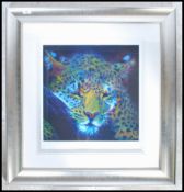 A Rolf  Harris limited edition framed and glazed print entitled ' Leopard at Night ' 48/95, signed