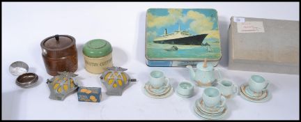 A collection of vintage items to include a pair of AA motoring car badges , a Huntley and Palmer