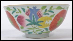 An 18th century Chinese porcelain footed bowl hand painted in enamels five colour decoration of