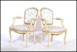 A good pair of early 20th century Louis XV style French carved gilt wood fauteuil / armchairs.