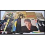 A collection of vinyl long play LP records featuring various artists to include Bryan Ferry, Barry