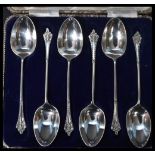 A cased set of six silver hallmarked Victorian coffee / tea spoons with finely embossed stems.